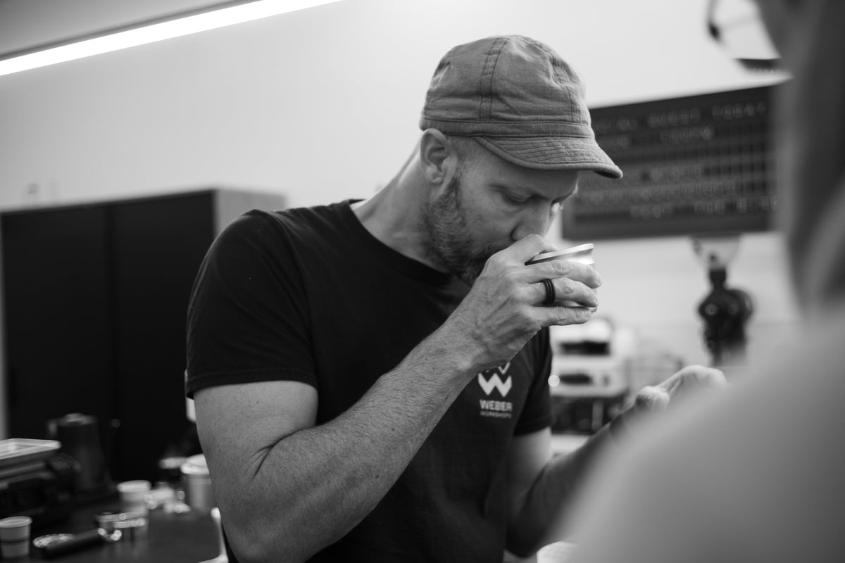 Douglas Weber tasting coffee during the workshop