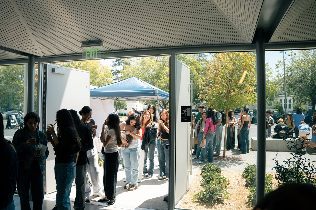 A line of guests entering Luma Coffee for the Nami Matcha pop-up