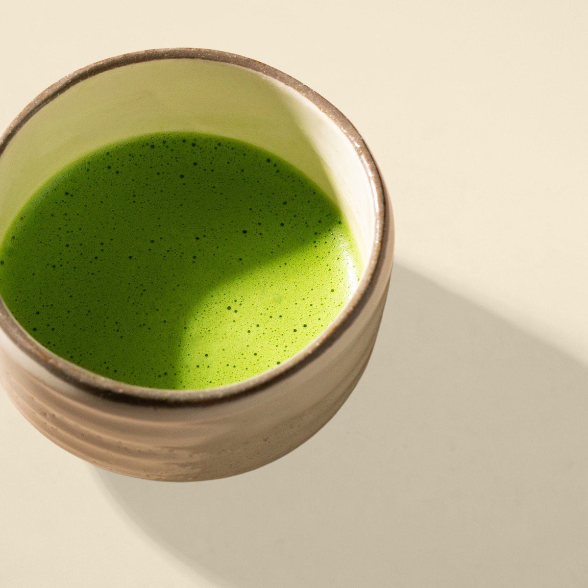 A cup of prepared Rishi Teahouse Matcha; cup not included