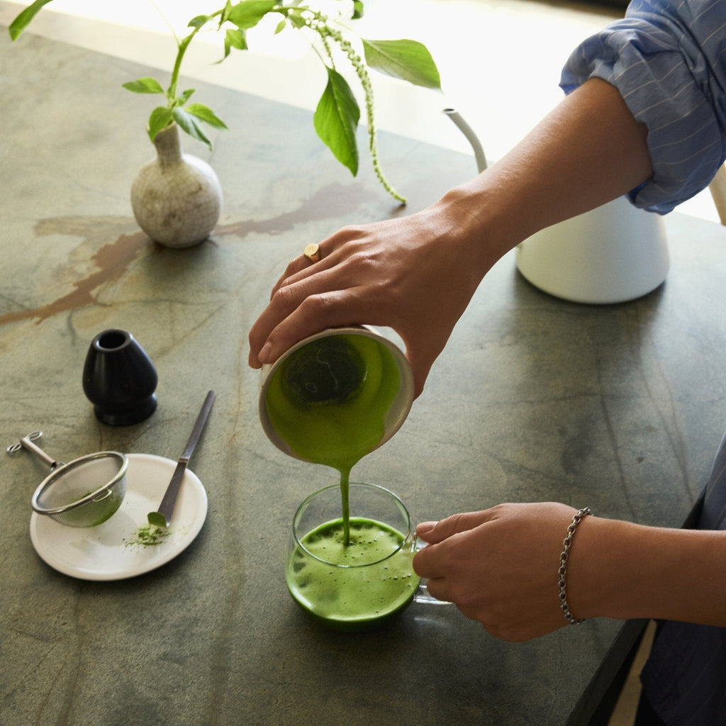 Rishi Teahouse Matcha being poured into a glass; teaware not included