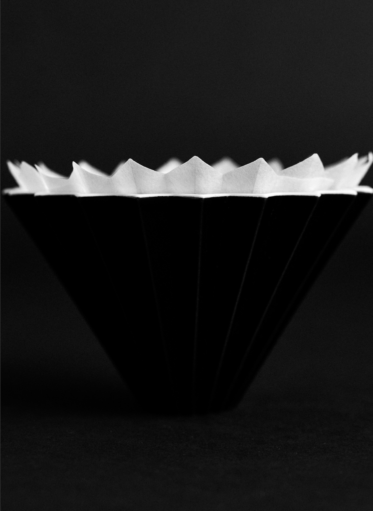 Side view of Sibarist ORIGAMI Special Edition paper in a dripper; filters only